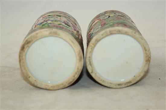 Pair of Chinese famille rose cylindrical brush pots, mid 19th century, 10.5cm., one cracked(-)